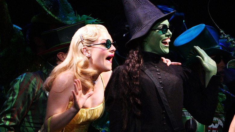 Actors performing as Glinda and the Wicked Witch