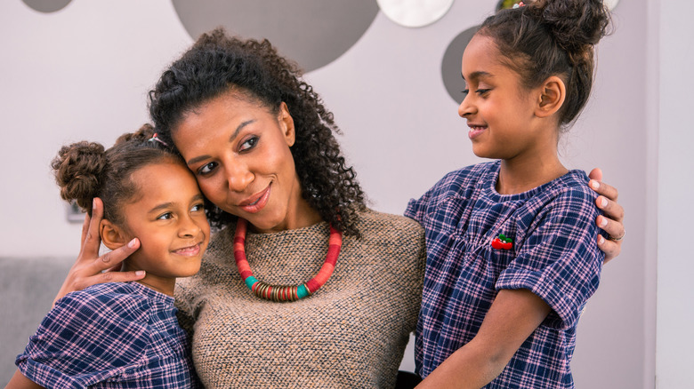 A mother and her two daughters