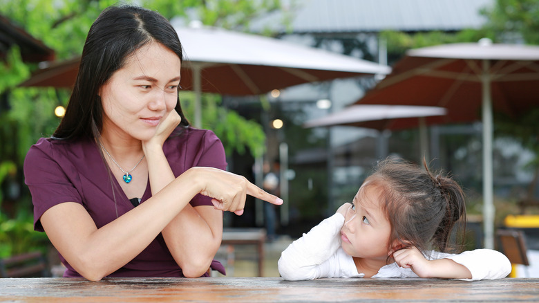 A mom lecturing her child