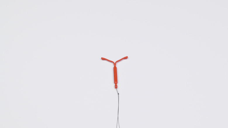 Photo of Mirena IUD on a white background 