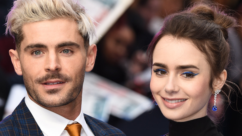 Zac Efron and Lily Collins pose for picture