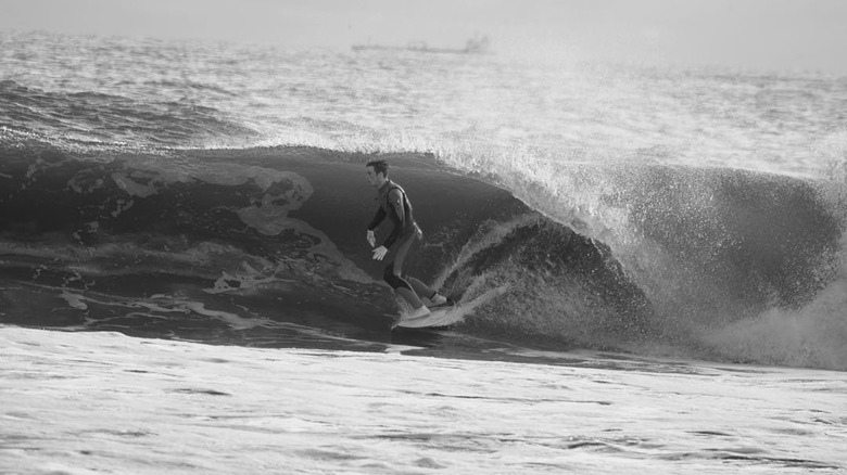 Cody Lohan surfing