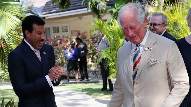 Lionel Richie laughs with King Charles