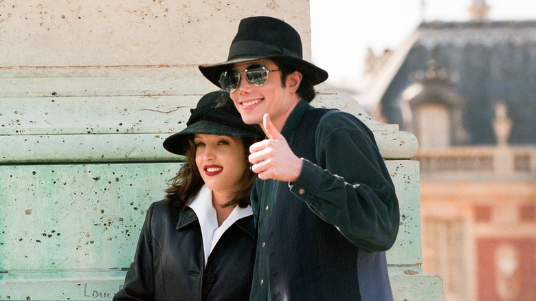 Lisa Marie Presley and Michael Jackson smiling