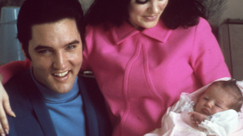 Elvis Presley with his wife Priscilla Beaulieu Presley and their 4 day old daughter Lisa Marie Presley in 1968 