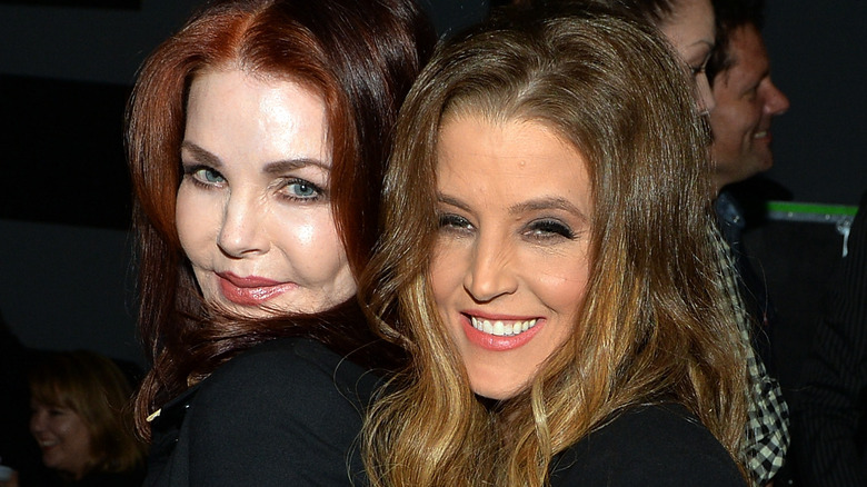 Priscilla and Lisa Marie Presley cuddling up 