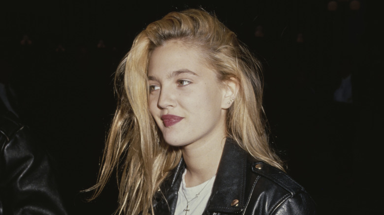 Drew Barrymore wearing a leather jacket