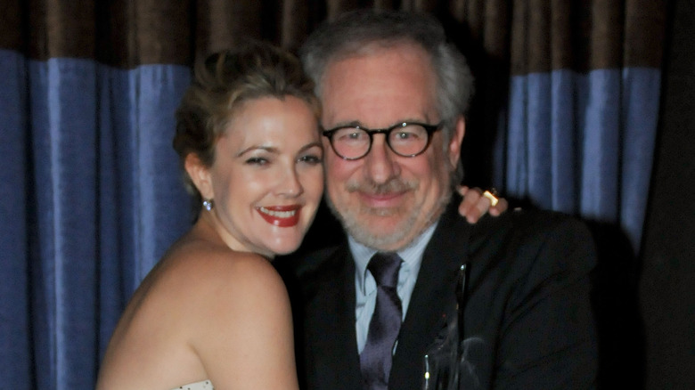 Drew Barrymore with Steven Spielberg at an event