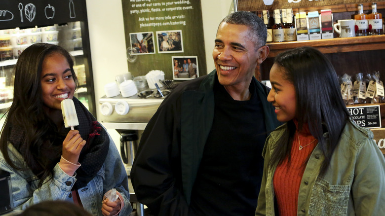 Barack Obama buying his daughters, Malia and Sasha, ice cream