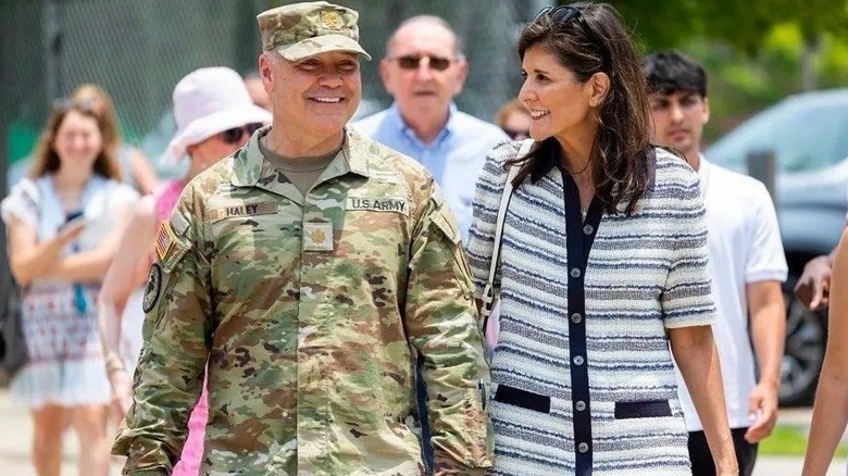 Michael Haley smiling while Nikki Haley smiles and looks at him