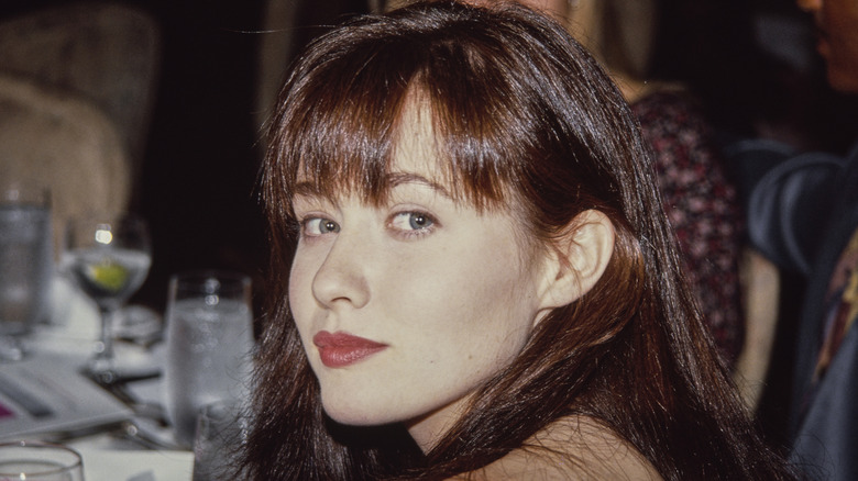 Shannen Doherty looking thoughtful