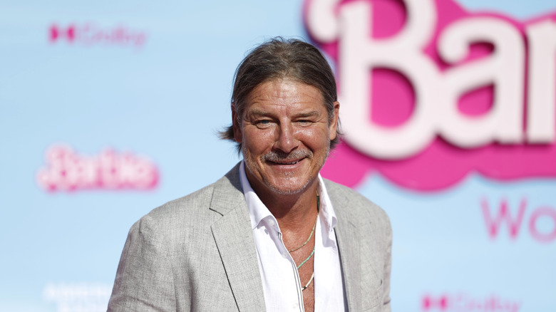 Ty Pennington posing on a red carpet