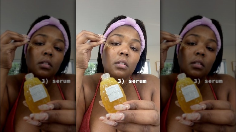 Lizzo using Glow Recipe serum