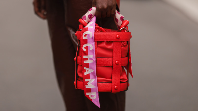 Close-up of red Longchamg bag