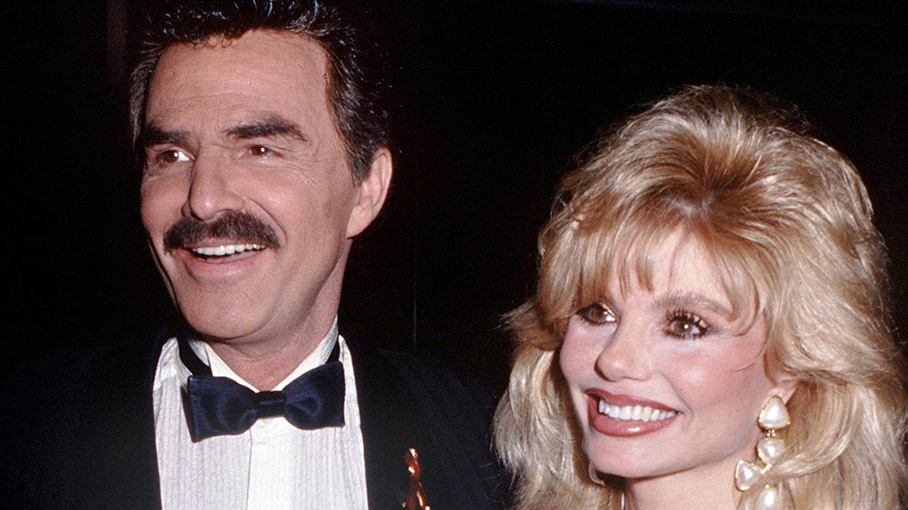 Burt Reynolds and Loni Anderson at a formal event