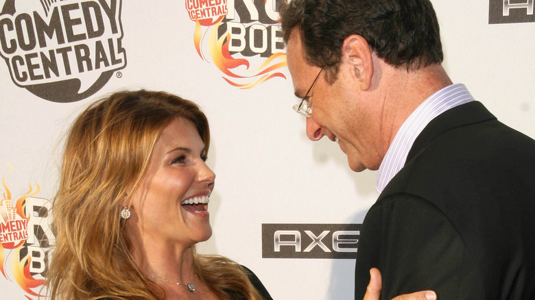 Lori Loughlin and Bob Saget laughing