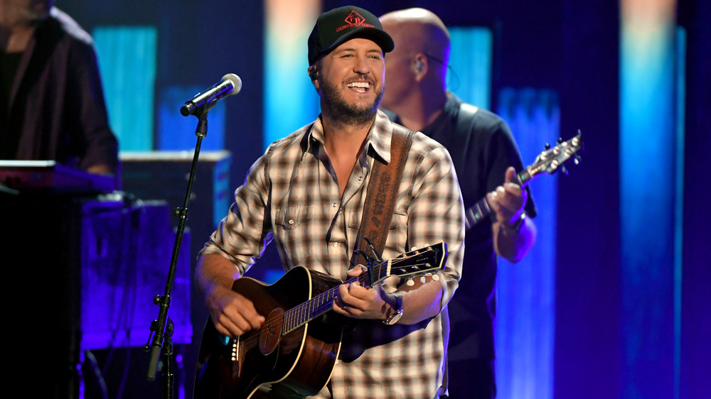 Luke Bryan sings in concert