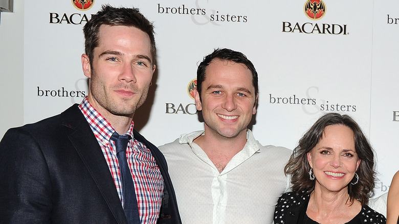 Luke Macfarlane, Matthew Rhys and Sally Field smiling