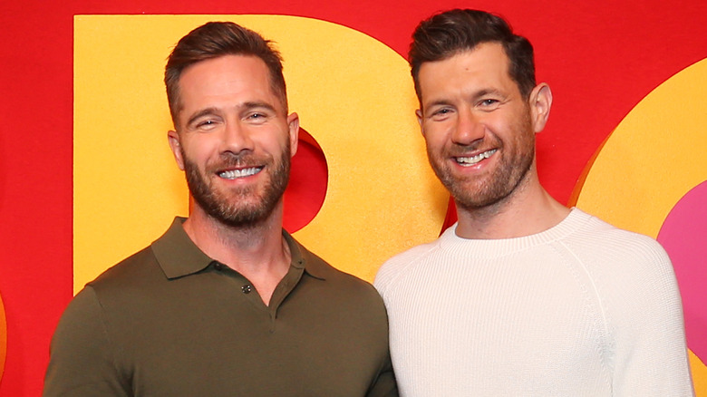 "Bros" stars Luke Macfarlane and Billy Eichner smiling