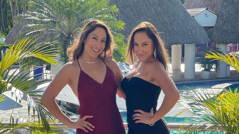 LuLu and LaLa Gonzalez posing in dresses