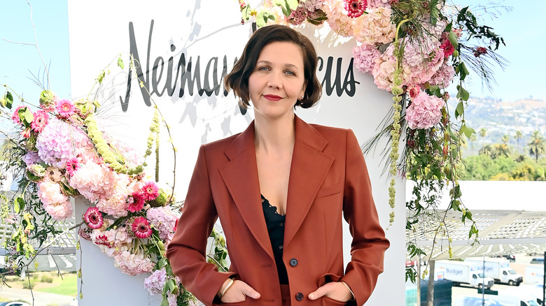 maggie gyllenhaal on a floral backdrop