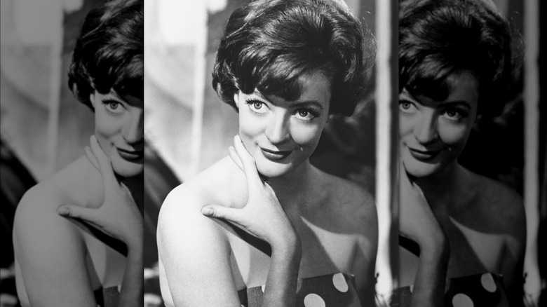 Maggie Smith smiling in 1963