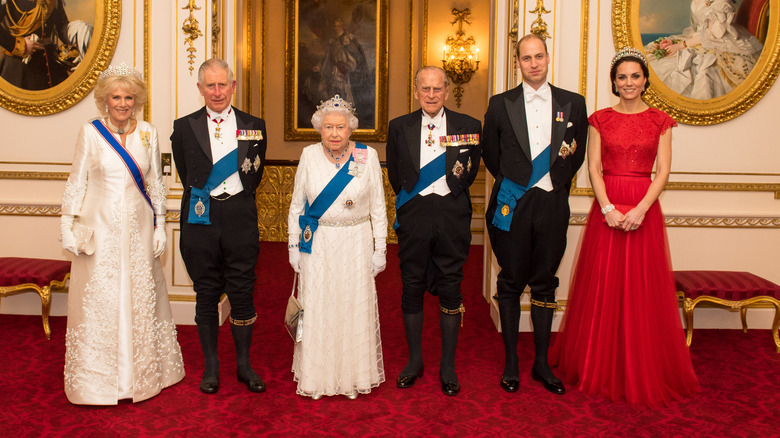 The royal family posing in Buckingham Palace