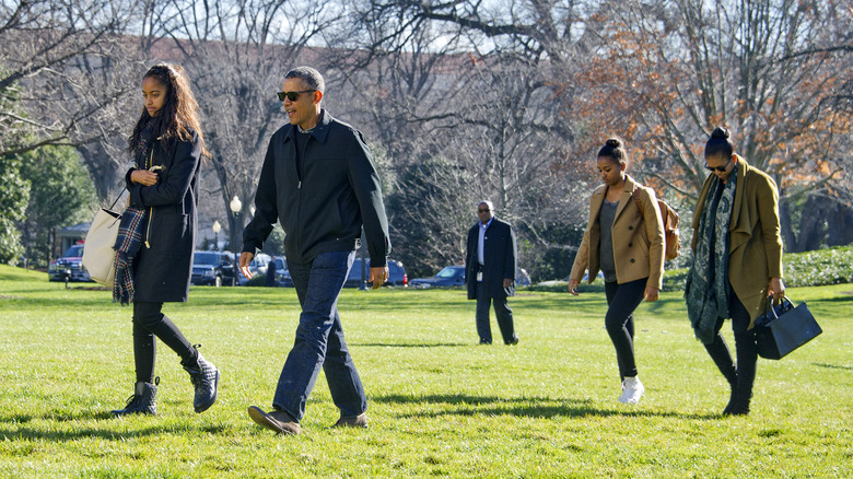Obama family walking outside