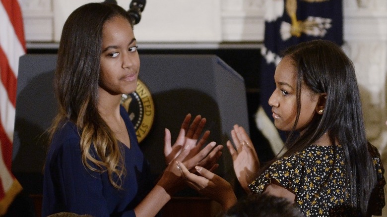 Malia and Sasha Obama at event