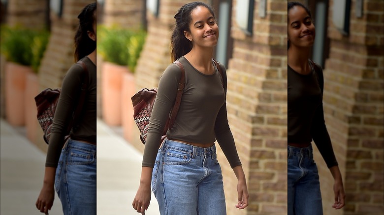 Malia Obama walking outside alone