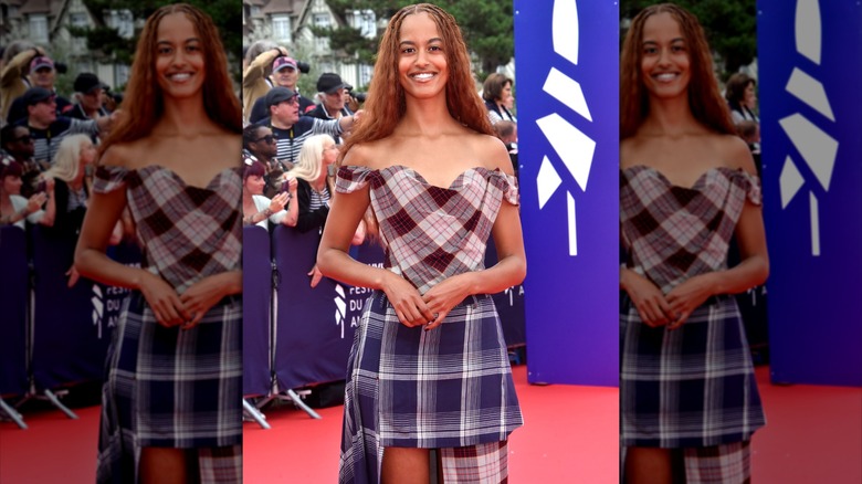 Malia Obama smiling on the red carpet