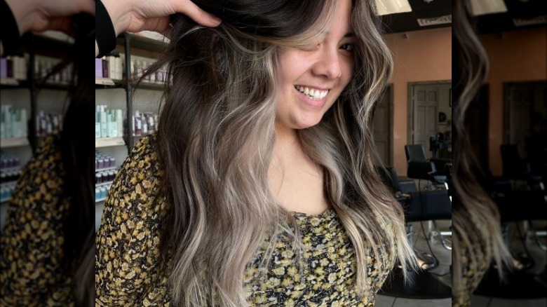 Woman with black-and-gray marbled hair