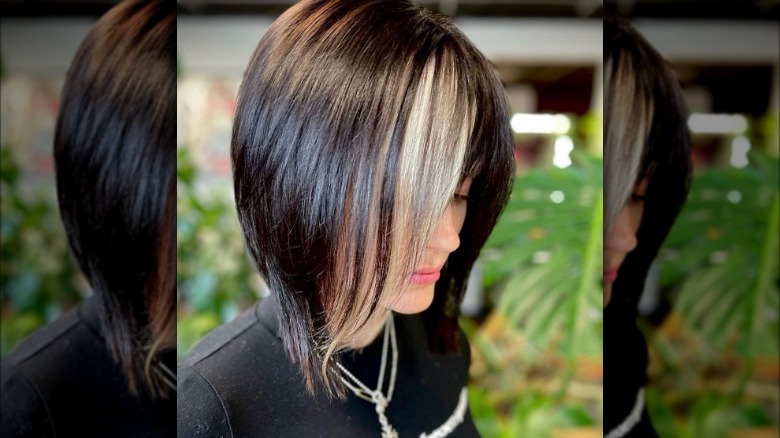 Woman with black-and-blond bob