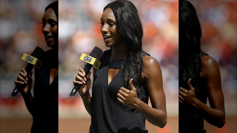 Maria Taylor speaking into a microphone