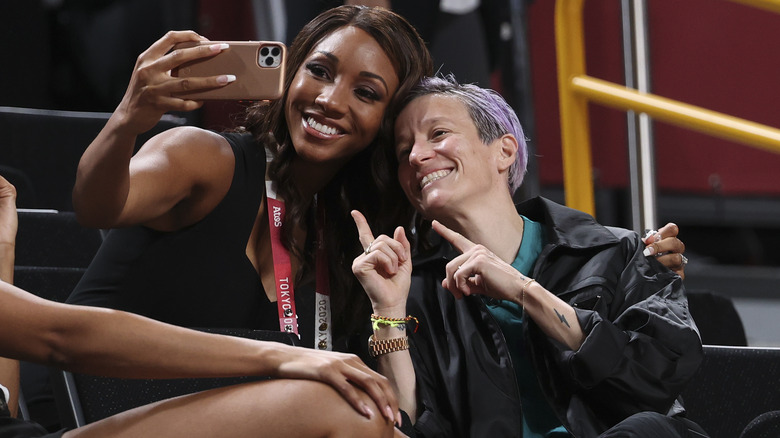 Maria Taylor taking a selfie with Megan Rapinoe