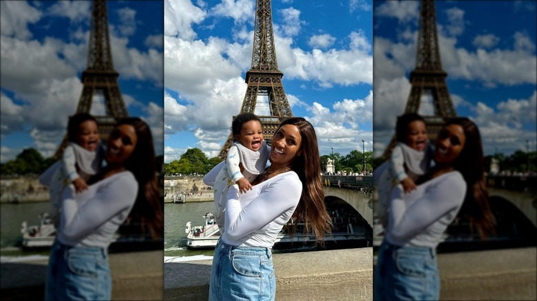 Maria Taylor and Roman Hemphill in front of Eiffel Tower