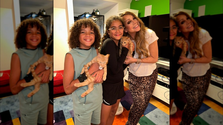 Moroccan, Monroe, and Mariah Carey posing with kittens