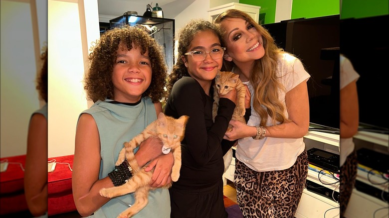 Mariah Carey with twins and cats