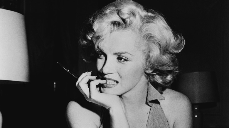 Marilyn Monroe biting nails