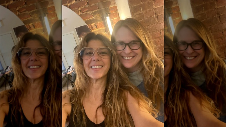 Marisa Tomei smiling with her hairstylist