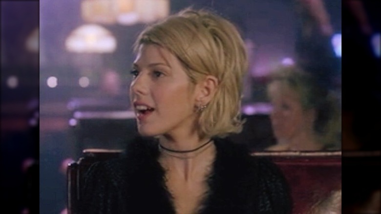 A blond Marisa Tomei talking in "Unhook the Stars"