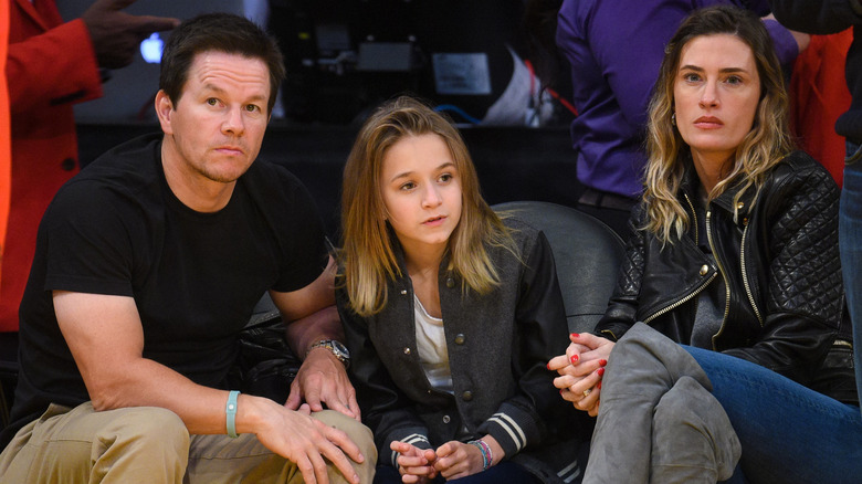 Mark Wahlberg and wife Rhea Durham with their daughter Ella at a basketball game