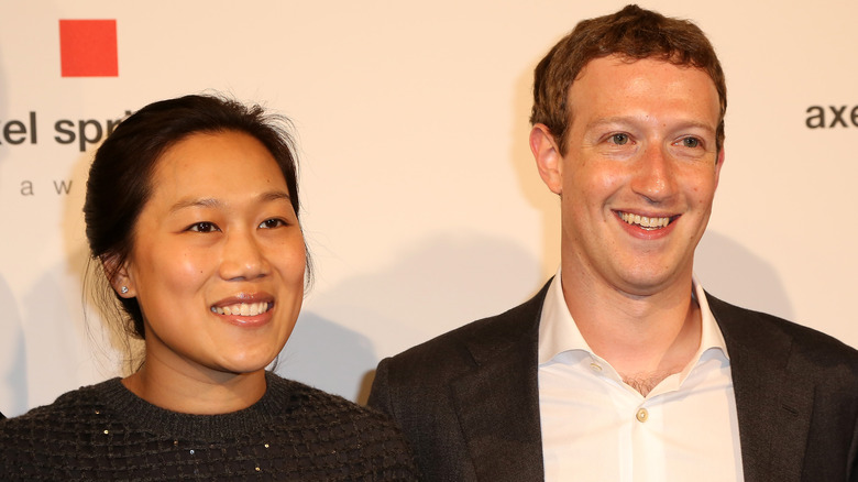 Facebook's Mark Zuckerberg ans Priscilla Chan smiling