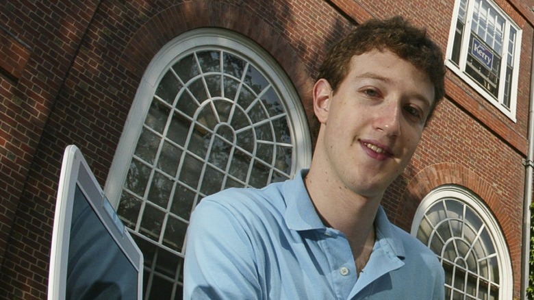 Mark Zuckerberg sitting outside at Harvard