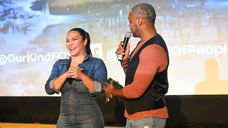 Egypt Sherrod and husband Mike Jackson speaking at event 
