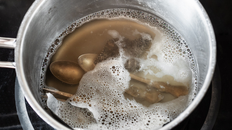 Silverware in boiling water