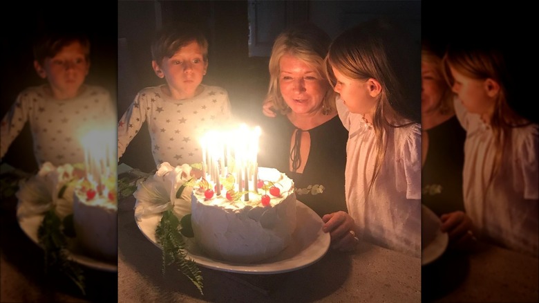 Martha Stewart posing with grandchildren