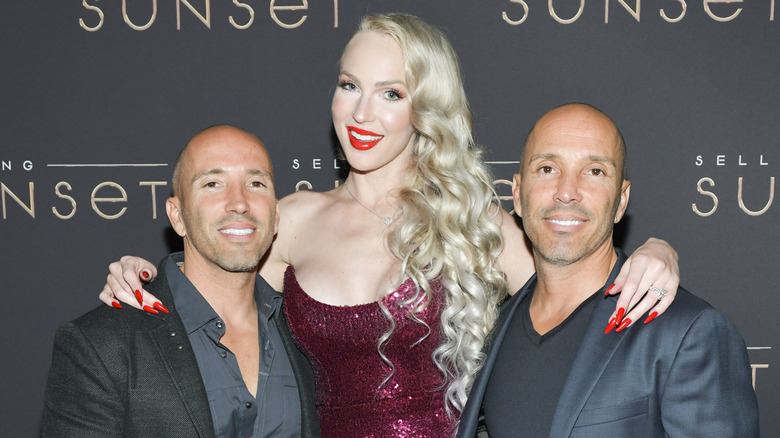 Christine Quinn posing with Brett and Jason Oppenheim