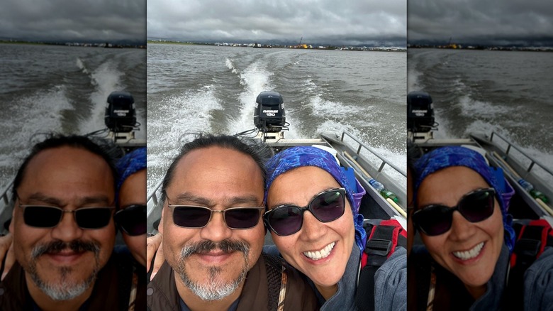 Mary Peltola smiling with her husband on boat