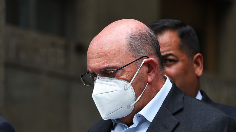 Allen Weisselberg in a mask on the day he was indicted